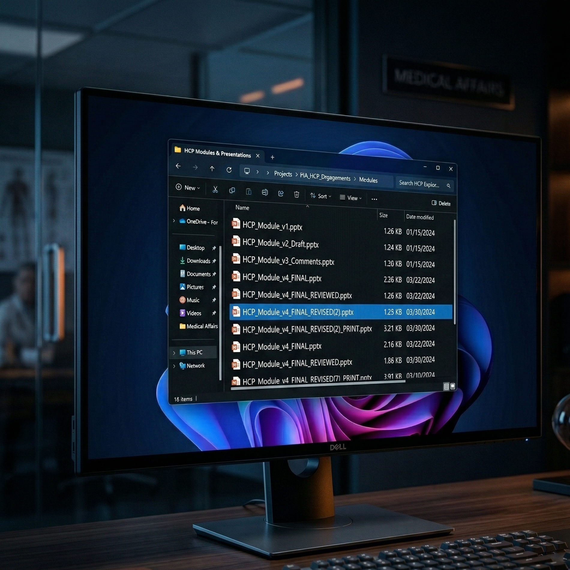 Sleek workstation showing messy PowerPoint file version names on a monitor